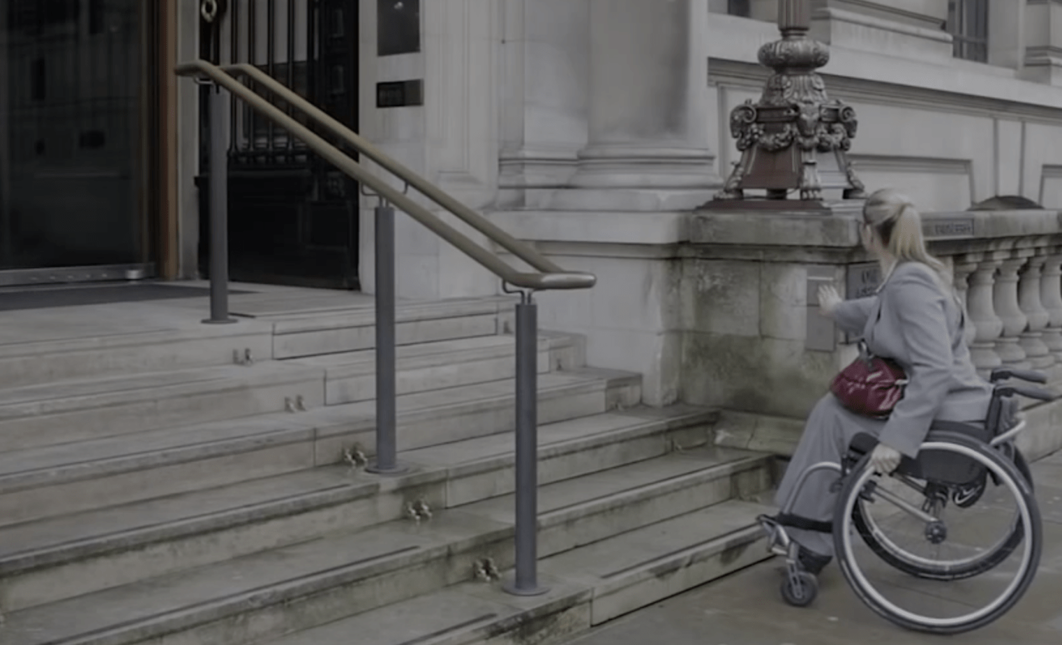 She cannot climb the stairs with her wheelchair. What happens next is incredible!